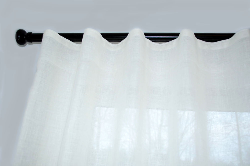 How do you hang curtains on a curtain track?
