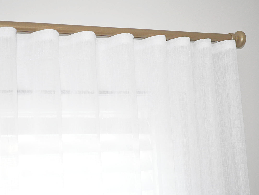 Sheer linen curtains on track