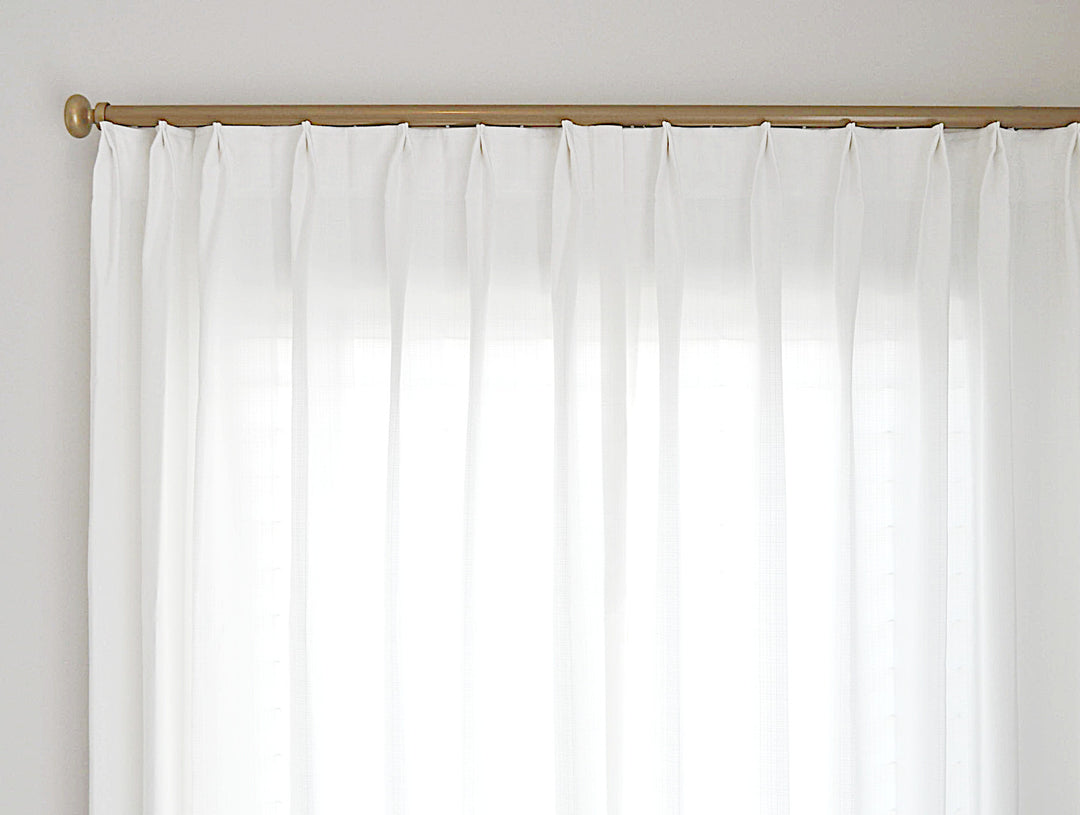 White faux linen Euro pleat on curtain track
