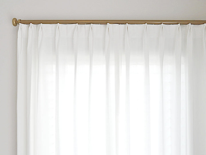 White faux linen Euro pleat on curtain track