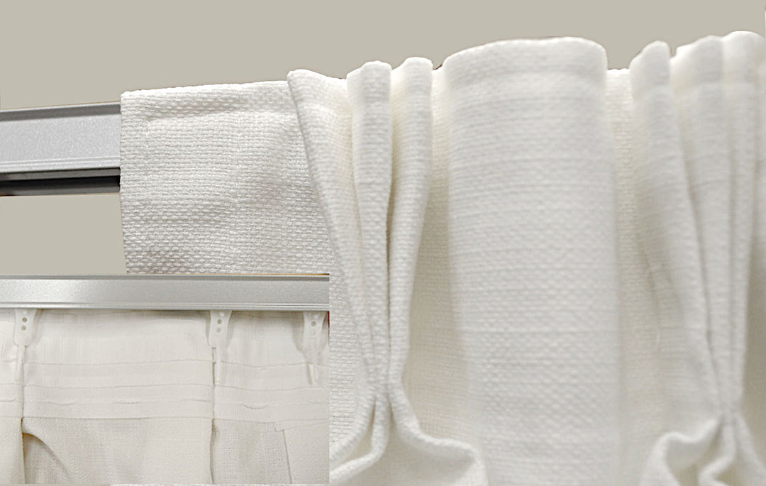pleated draperies on ball bearing carriers