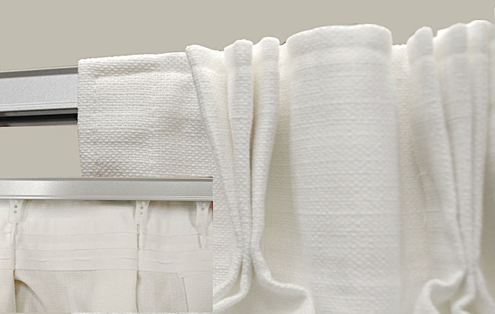 pleated draperies on ball bearing carriers