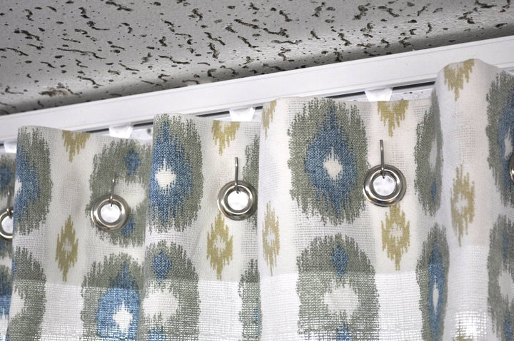 Grommet curtain on white track